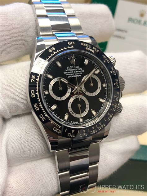 rolex daytona steel black dial.